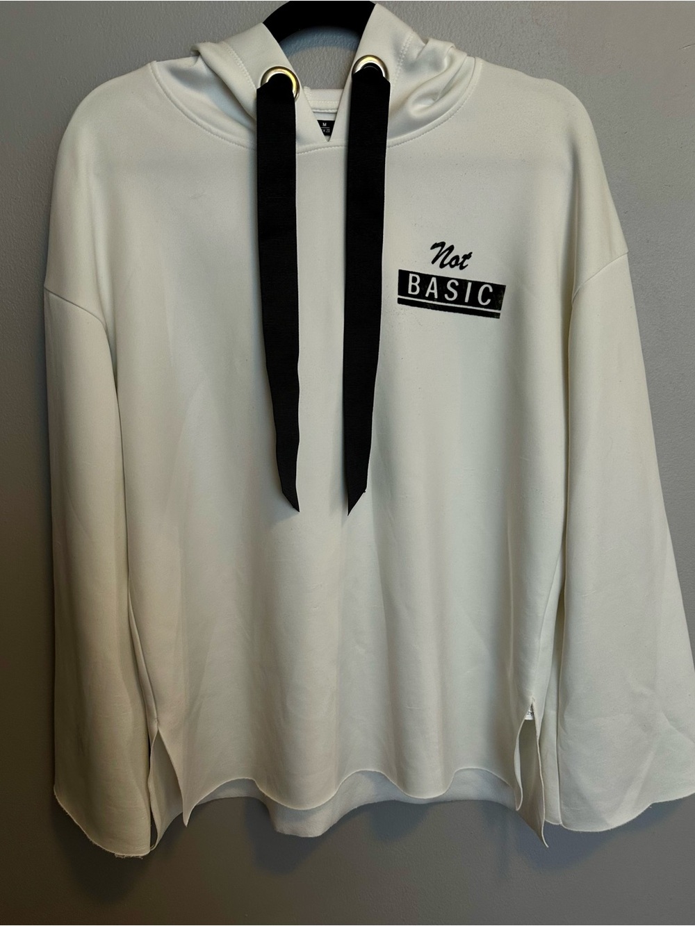Bershka White Hoodie with Black Drawstrings and 'Not BASIC' Detail